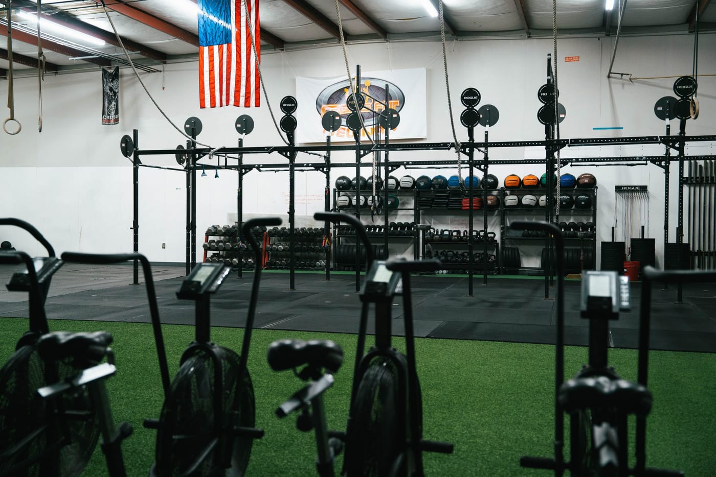 Bikes and rig inside the FITT Warehouse gym